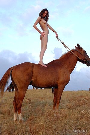 Pale skinned beauty enjoys naked horseback riding and being a horse girl
