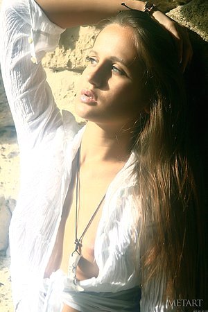 Brunette with a sexy physique is here to pose like never before
