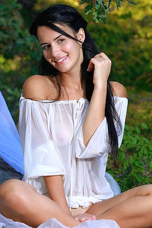 Gorgeous teen brunette with tan lines exposes her pussy outdoors