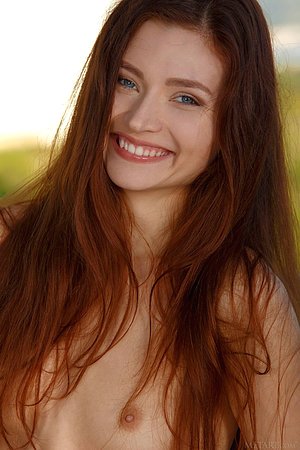 Black bikini auburn-haired beauty shows her perfect peachy pussy for you