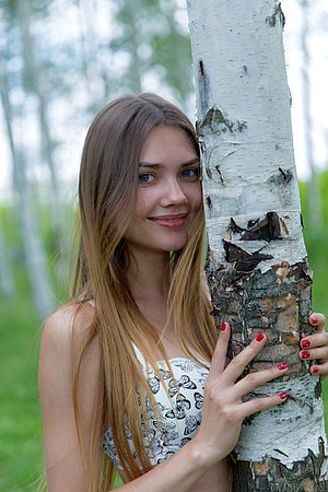 Brown-haired teen baring her beautiful body in the middle of nowhere