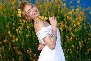 White dress blue-eyed blonde taking it all off to pose naked