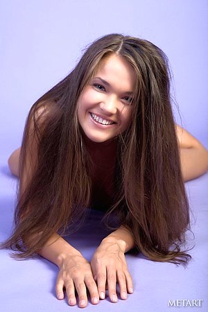 Adorable brunette posing naked and showing her perfect pussy