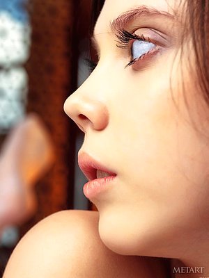 Beauty in white stockings showing her flower while on the bed