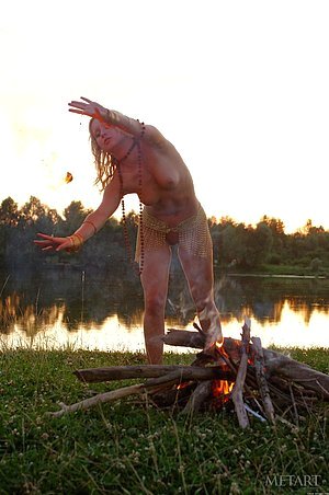 Genuinely gorgeous blonde performs a ritual while totally naked